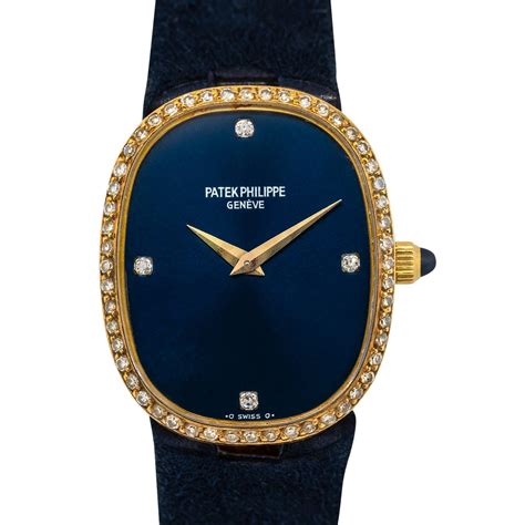 patek philippe golden ellipse blue dial yellow gold diamond watch|Patek Philippe vintage gold watch.